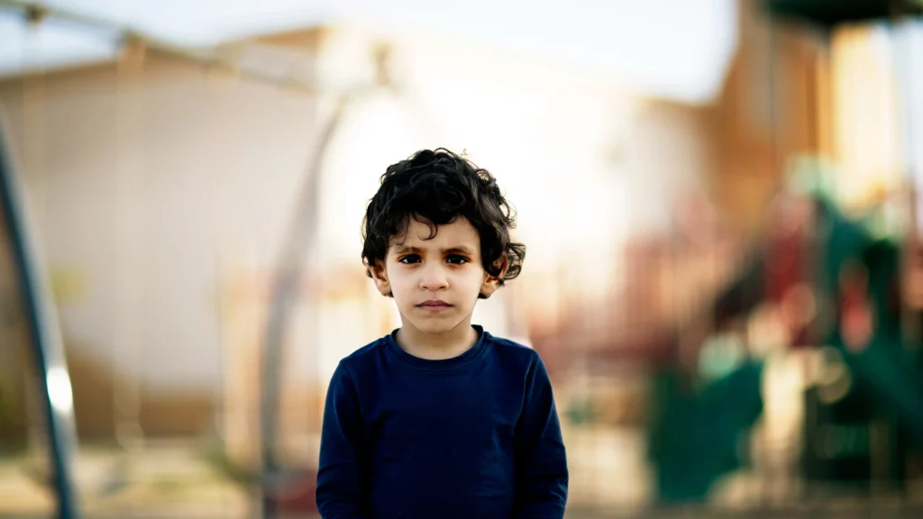 photo small boy sullen sad